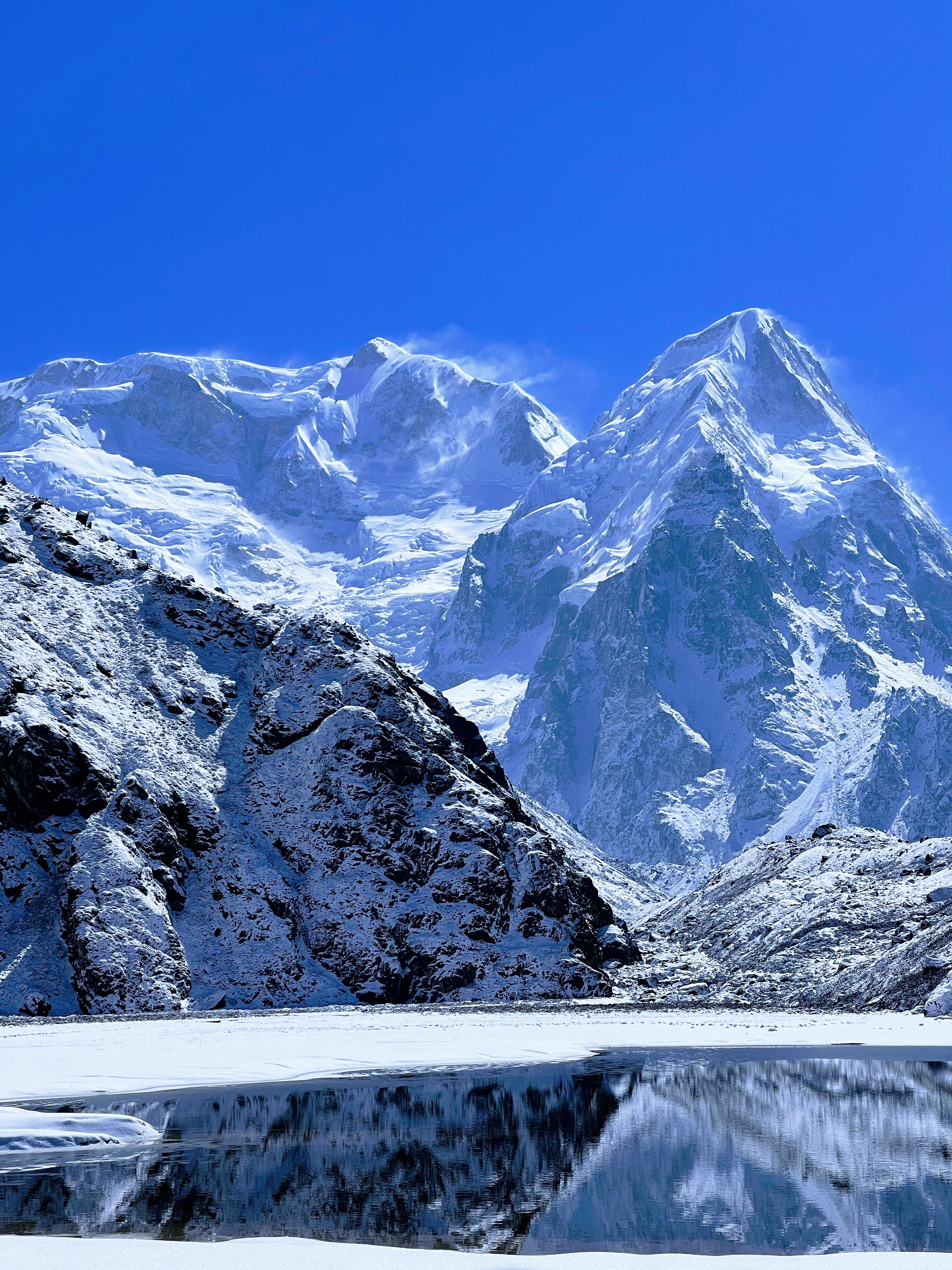 Pangpema Base Camp in the Kanchenjunga Region, with majestic mountains towering in the background, offering an awe-inspiring trekking experience in Eastern Nepal.